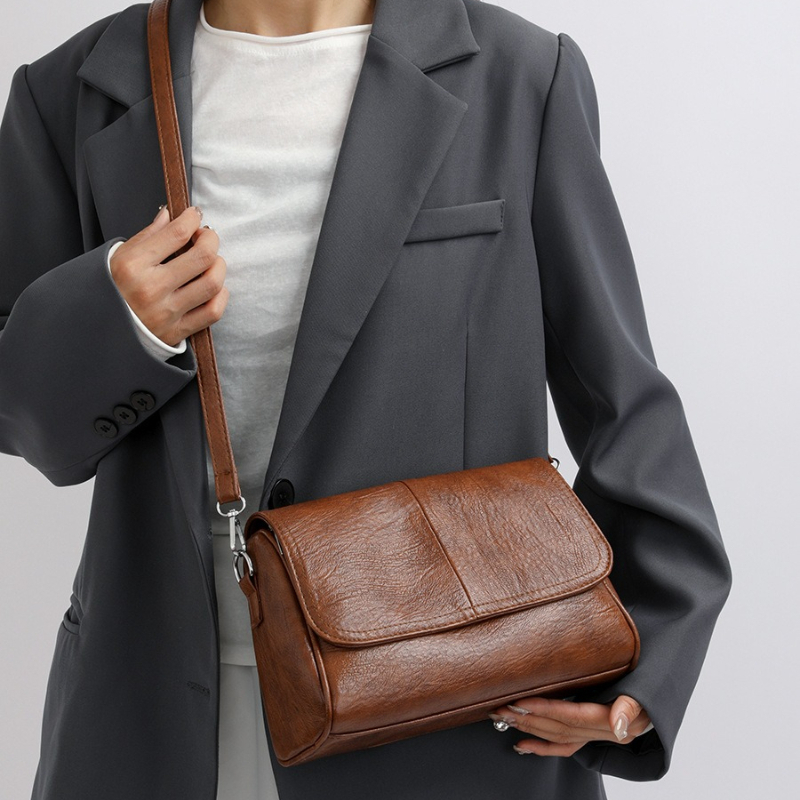 Miękka torebka crossbody z imi – Leatherwork Fasteners recenzja i cena